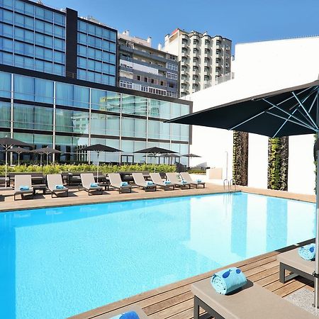 فندق إيبيروستار سيلكشين لشبونة Lisboa المظهر الخارجي الصورة The swimming pool at the hotel