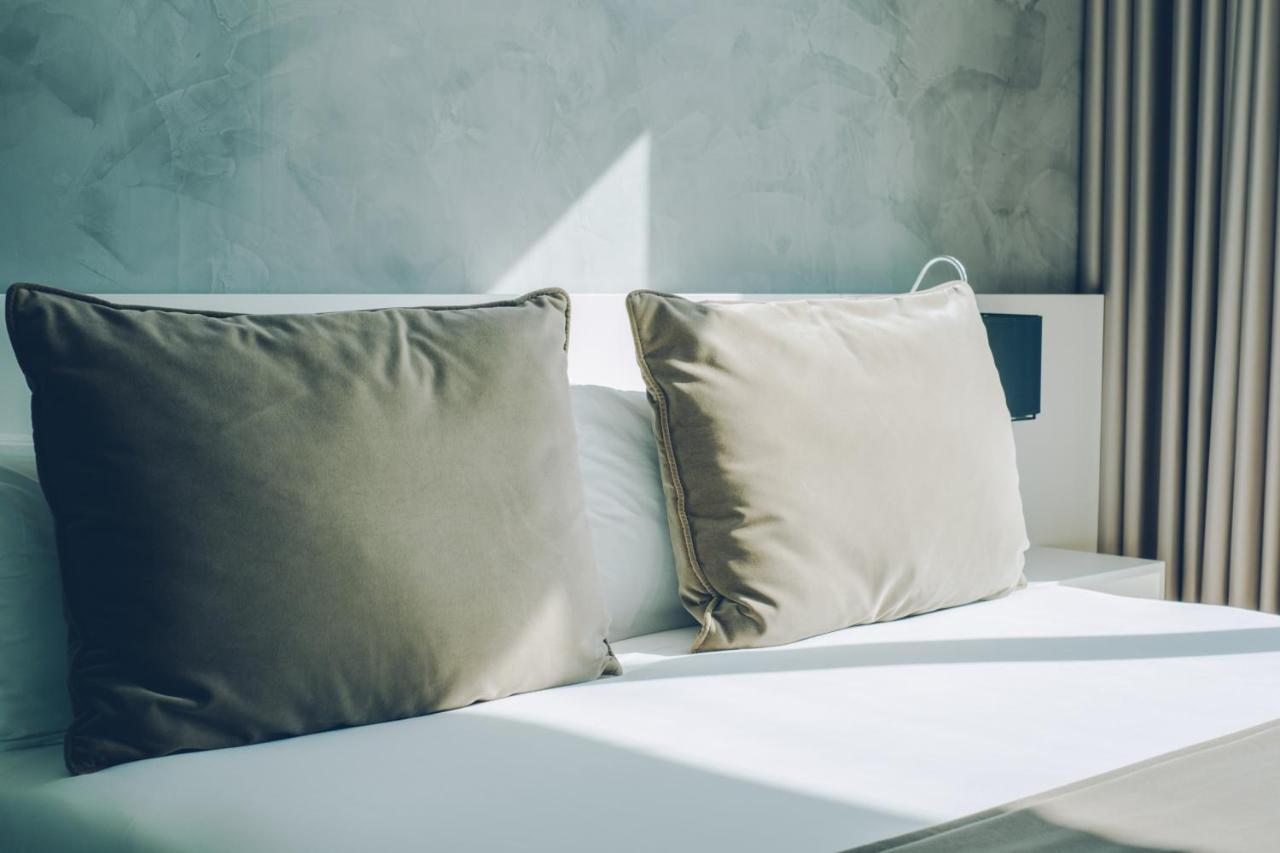 فندق إيبيروستار سيلكشين لشبونة Lisboa المظهر الخارجي الصورة Pillows on a bed