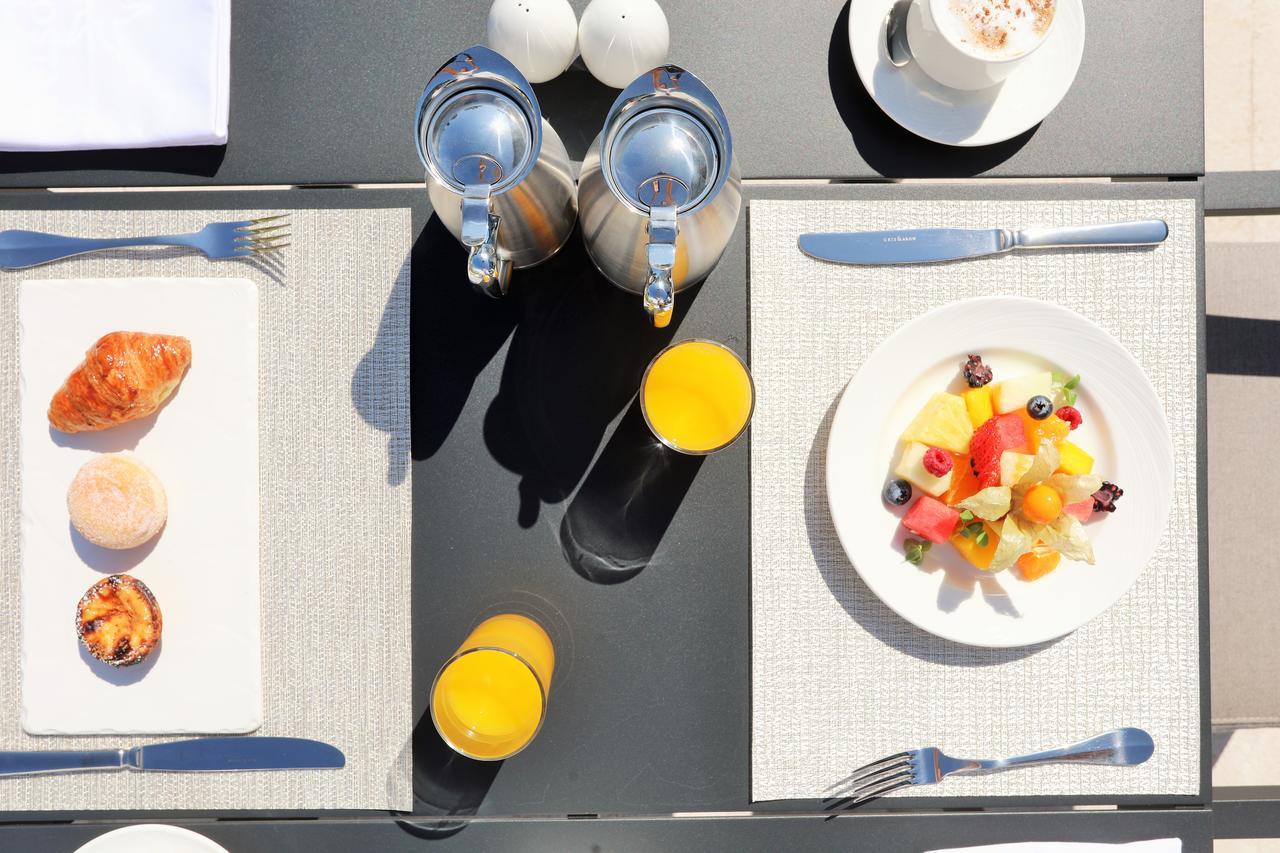 فندق إيبيروستار سيلكشين لشبونة Lisboa المظهر الخارجي الصورة A place setting