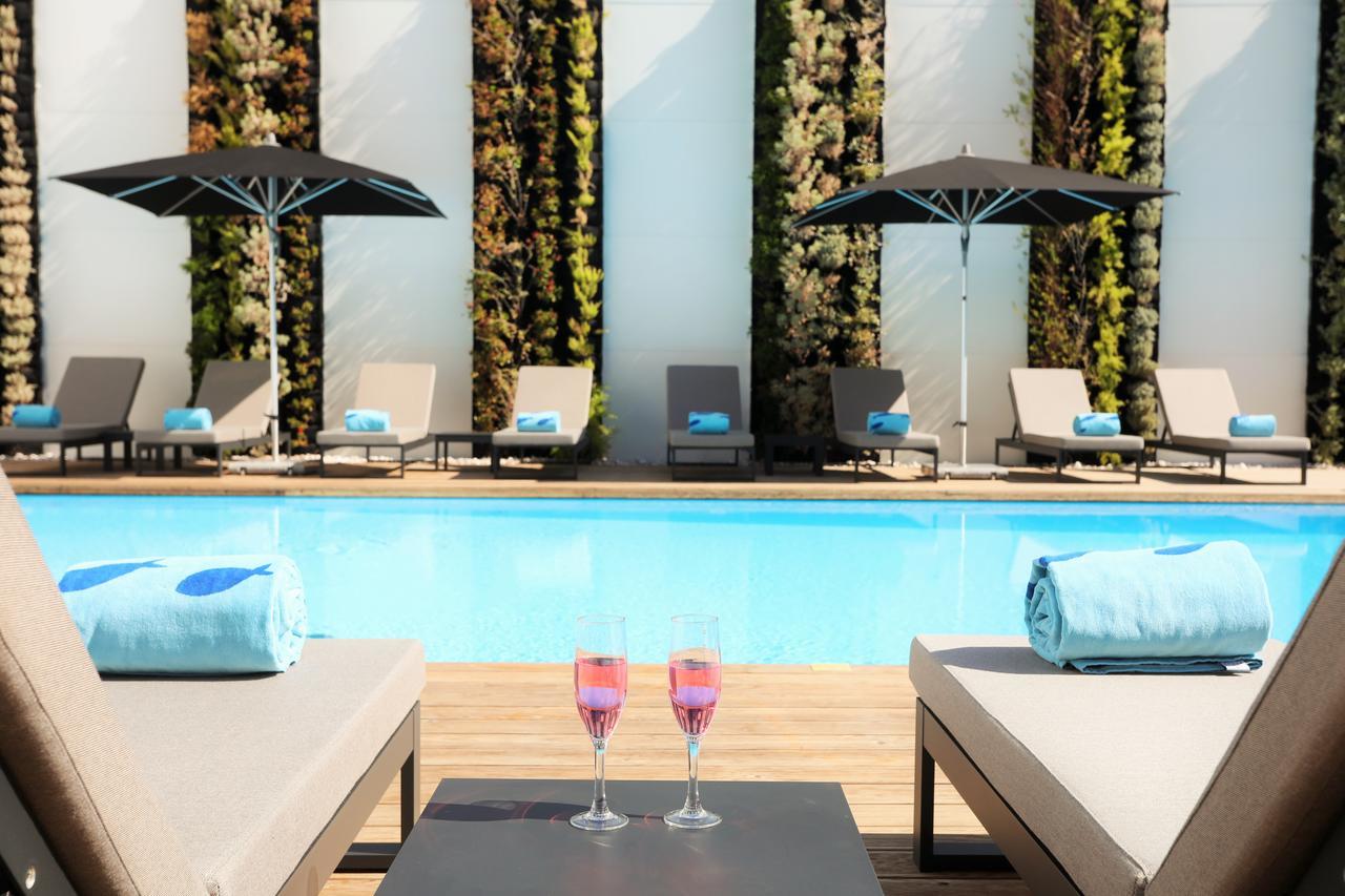 فندق إيبيروستار سيلكشين لشبونة Lisboa المظهر الخارجي الصورة The pool at the hotel